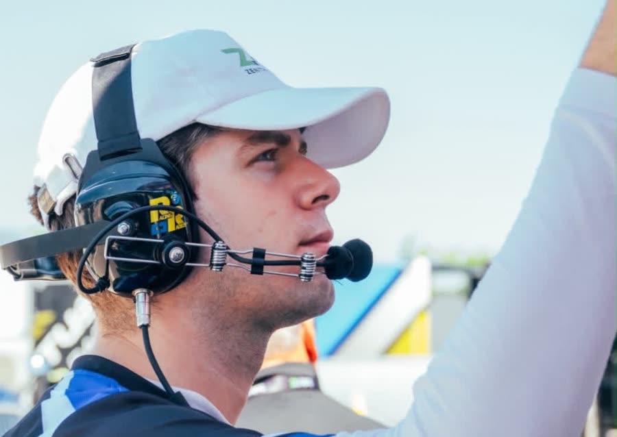 Ren on the radio in the pits